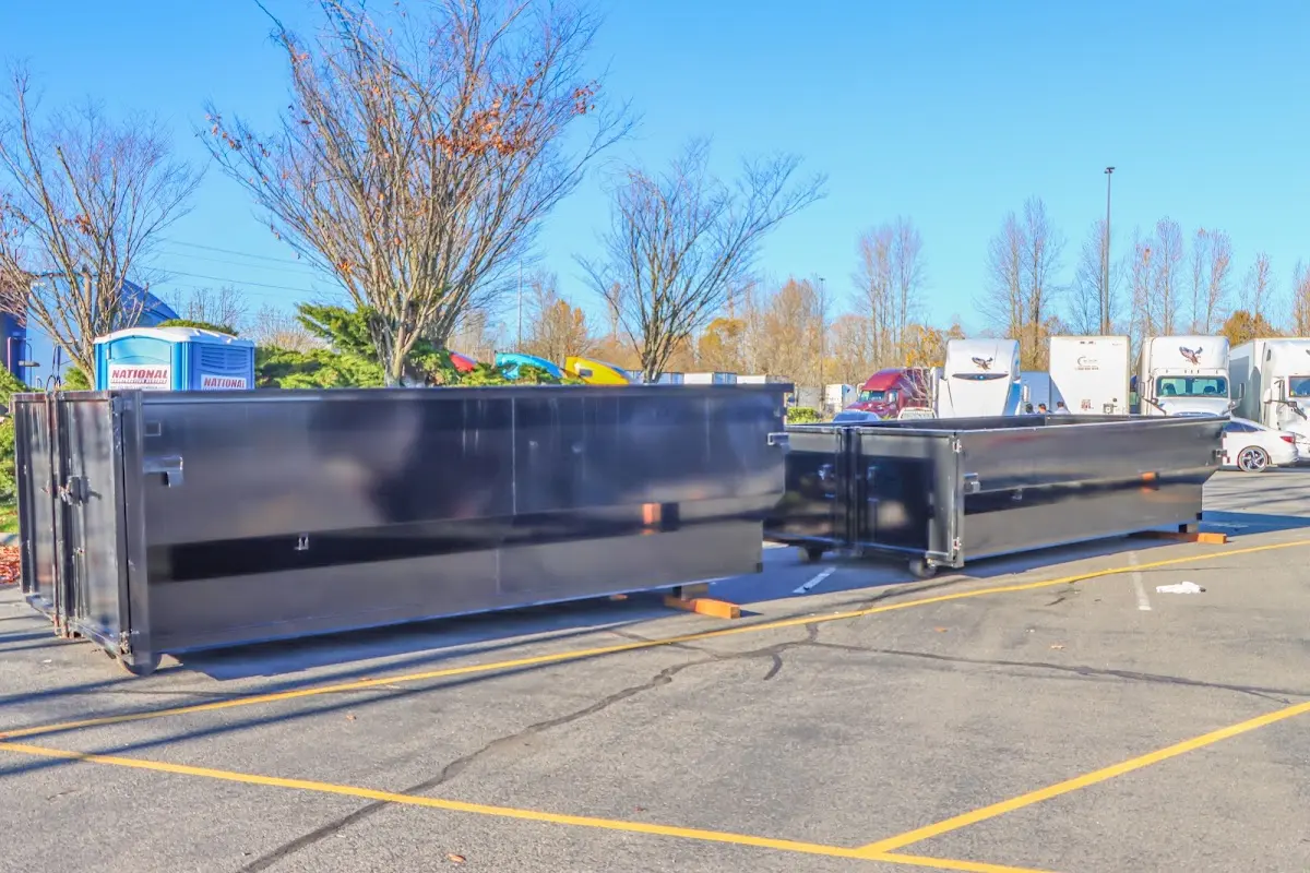Professional dumpster rental service with roll-off container on residential driveway in North Richland Hills
